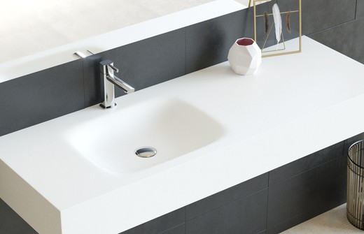 Solid countertop with centered Asthon offset basin, skirt and supports