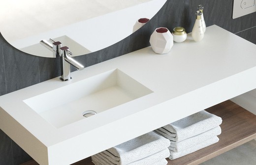 Solid countertop with centered Inca offset basin, skirt and supports