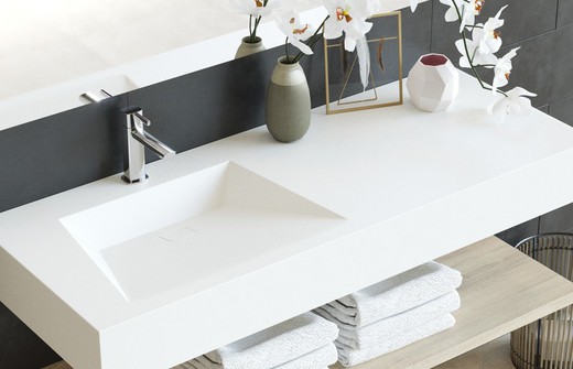 Solid countertop with centered Manhattan offset basin, skirt and supports
