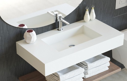 Solid countertop with centered Inca basin, skirt and supports