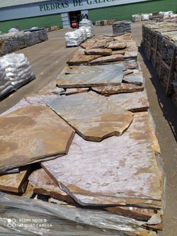 Pallet onregelmatige donkere zalmrode kwartsietplaat